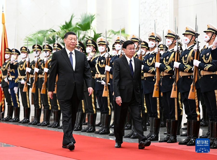 习近平同老挝人民革命党中央总书记、国家主席通伦举行会谈